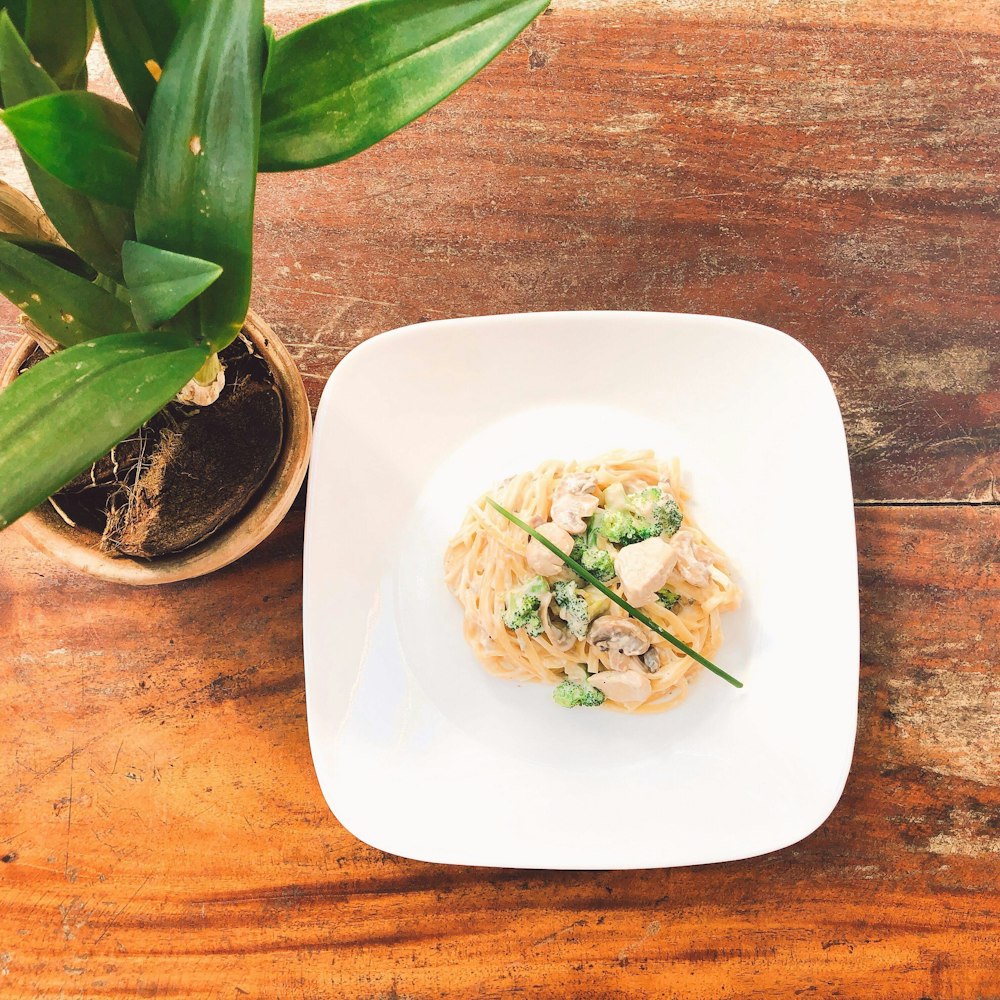 cooked food on white ceramic plate close-up photography