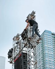 A scaffolding setup reaching a high building.