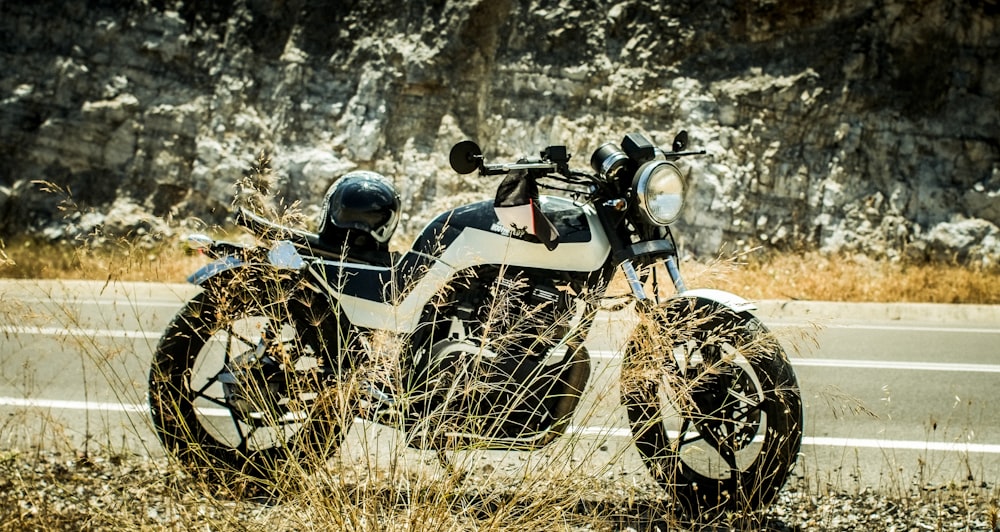 a motorcycle parked on the side of the road