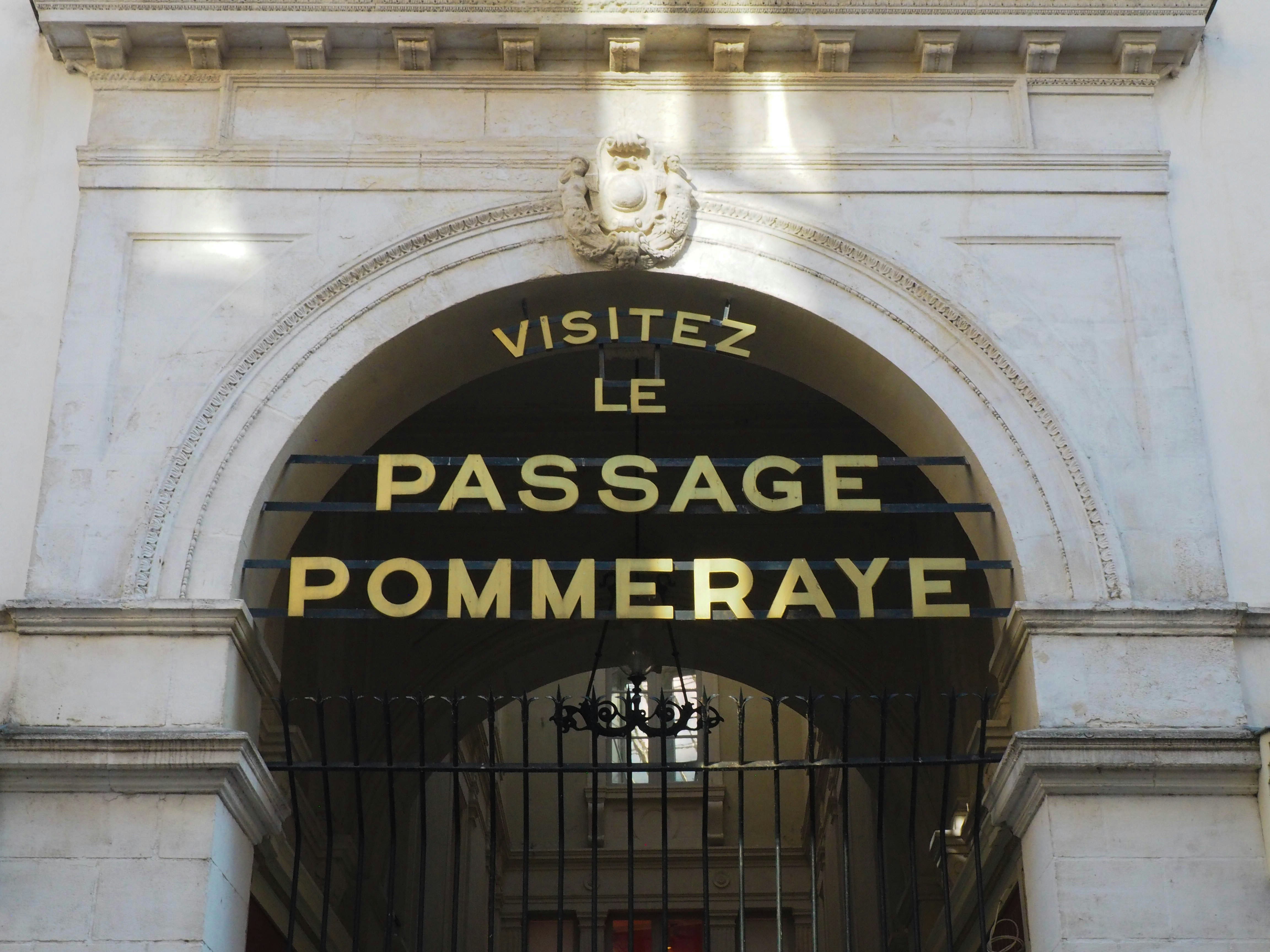 Sign on a side entrance of the Pommeray Passage