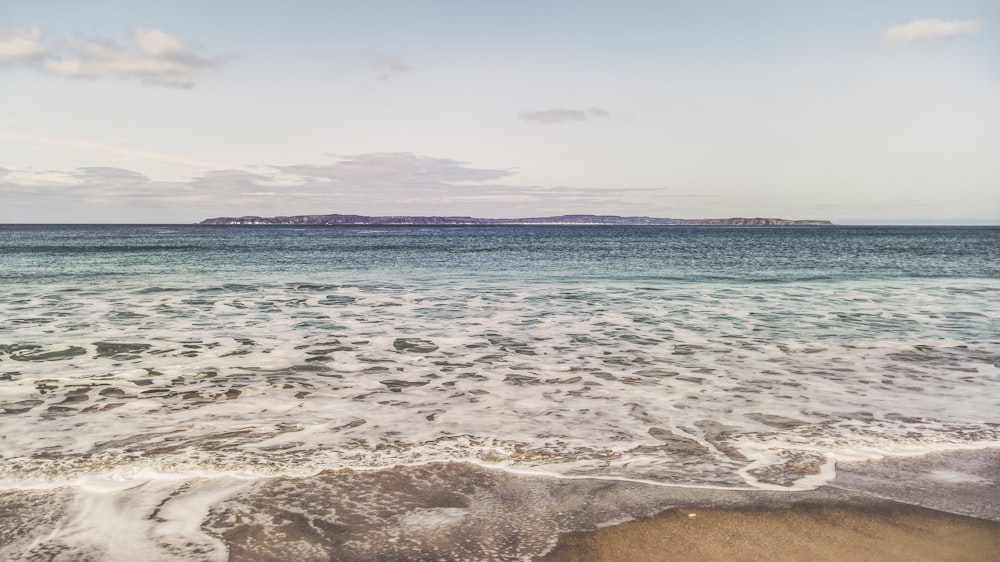 a view of the ocean from the beach