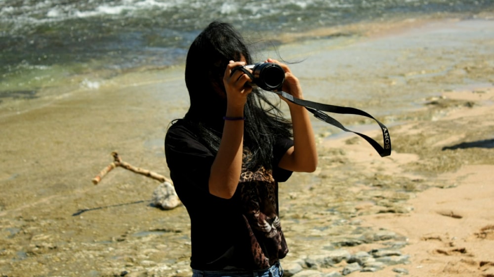 woman holding camera