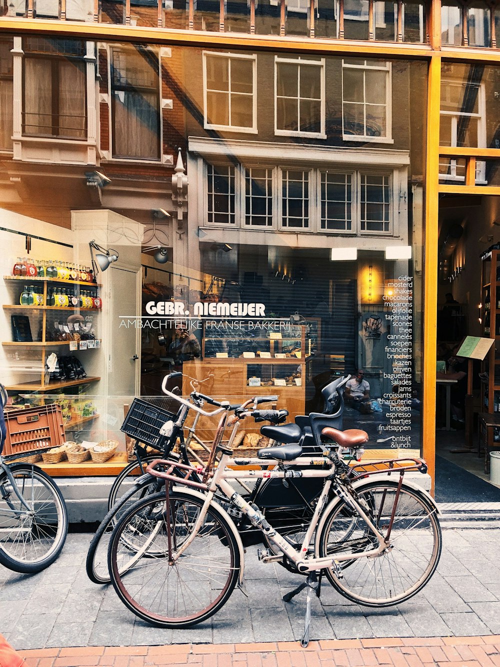 bicycles parked on street near store