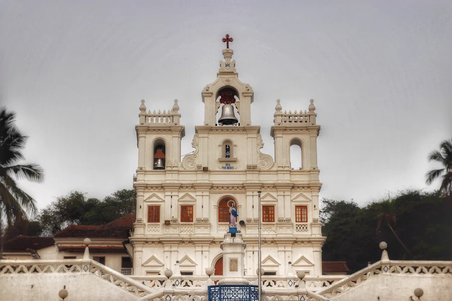 The white baroque facade of Our Lady of the Immaculate Conception Church, Panjim