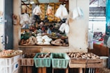 A colorful farmer's market stall brimming with seasonal produce.