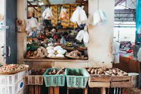 Close-up of vibrant fresh vegetables and fruits arranged artfully on a market stall