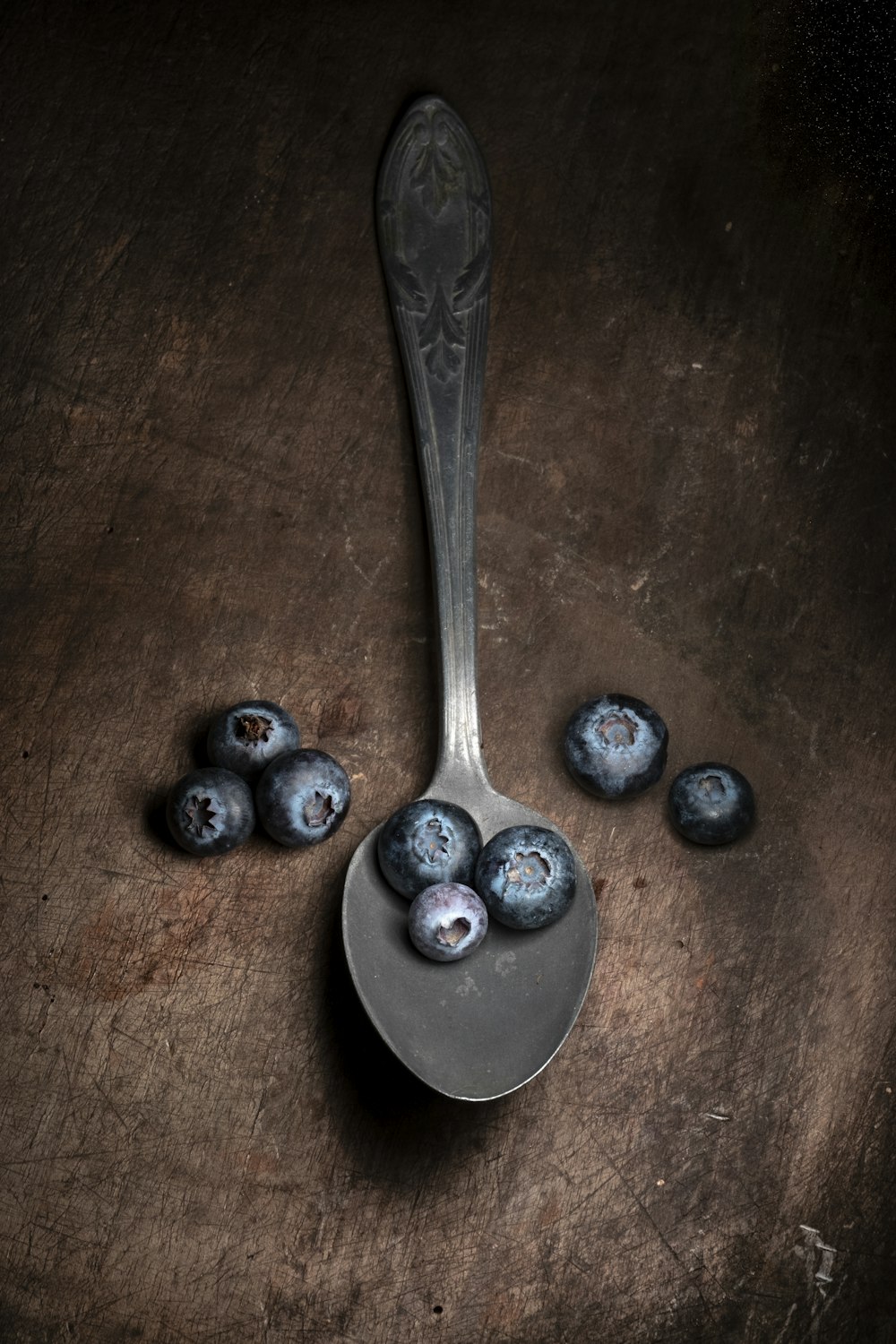 blueberries on spoon