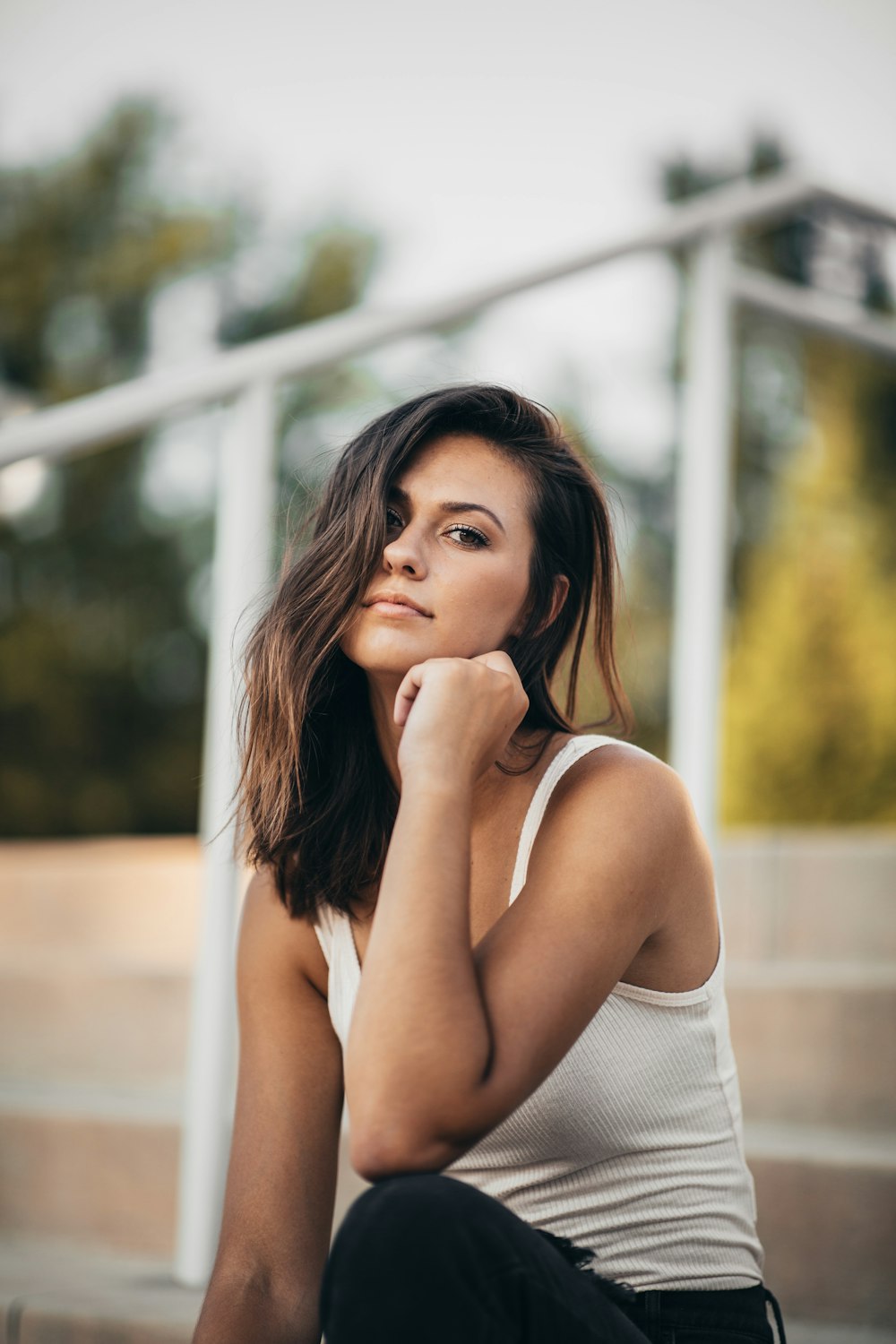 woman wearing white cami top