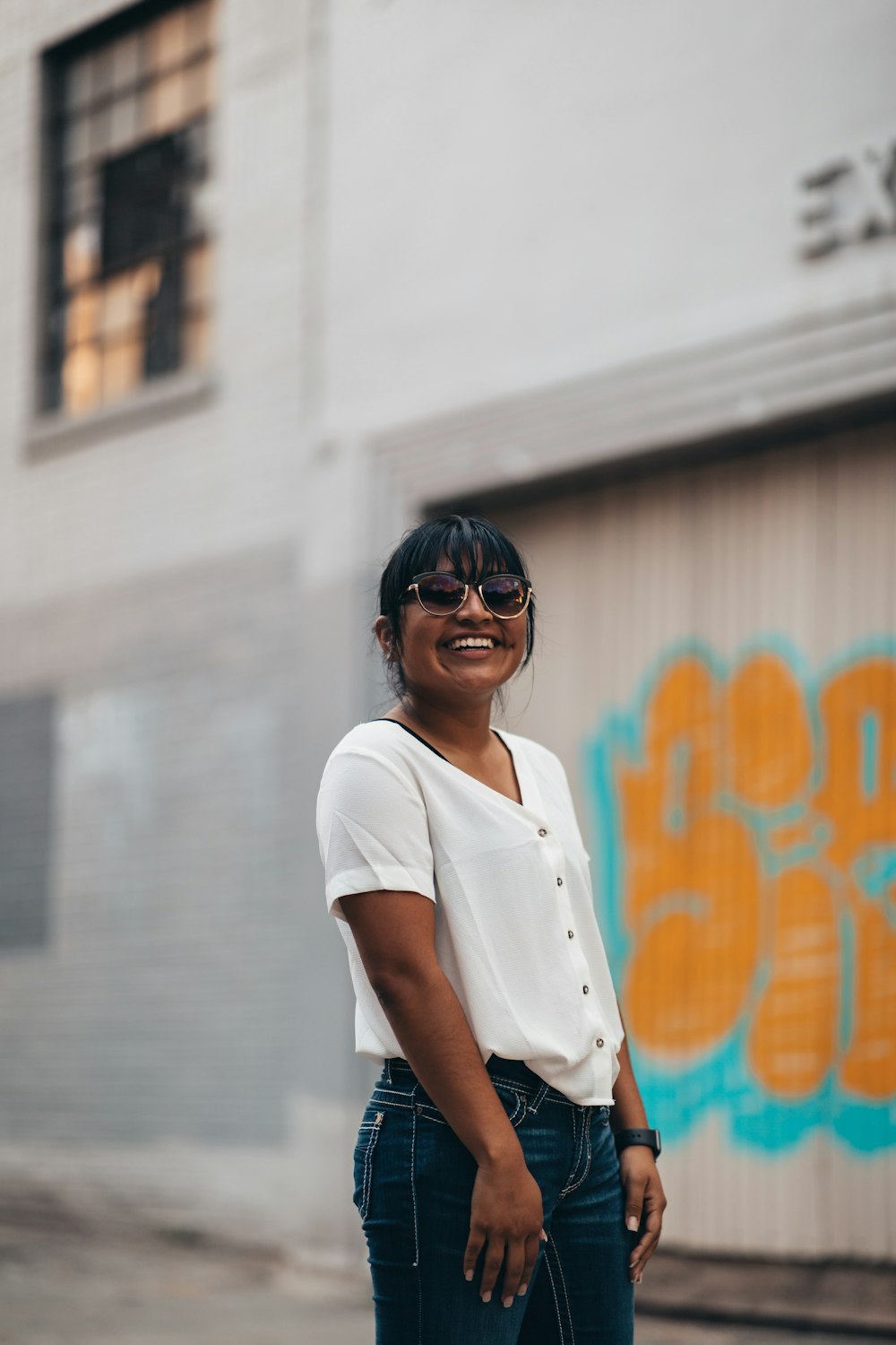 woman wears white blouse