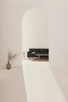 black and brown leather padded tub sofa