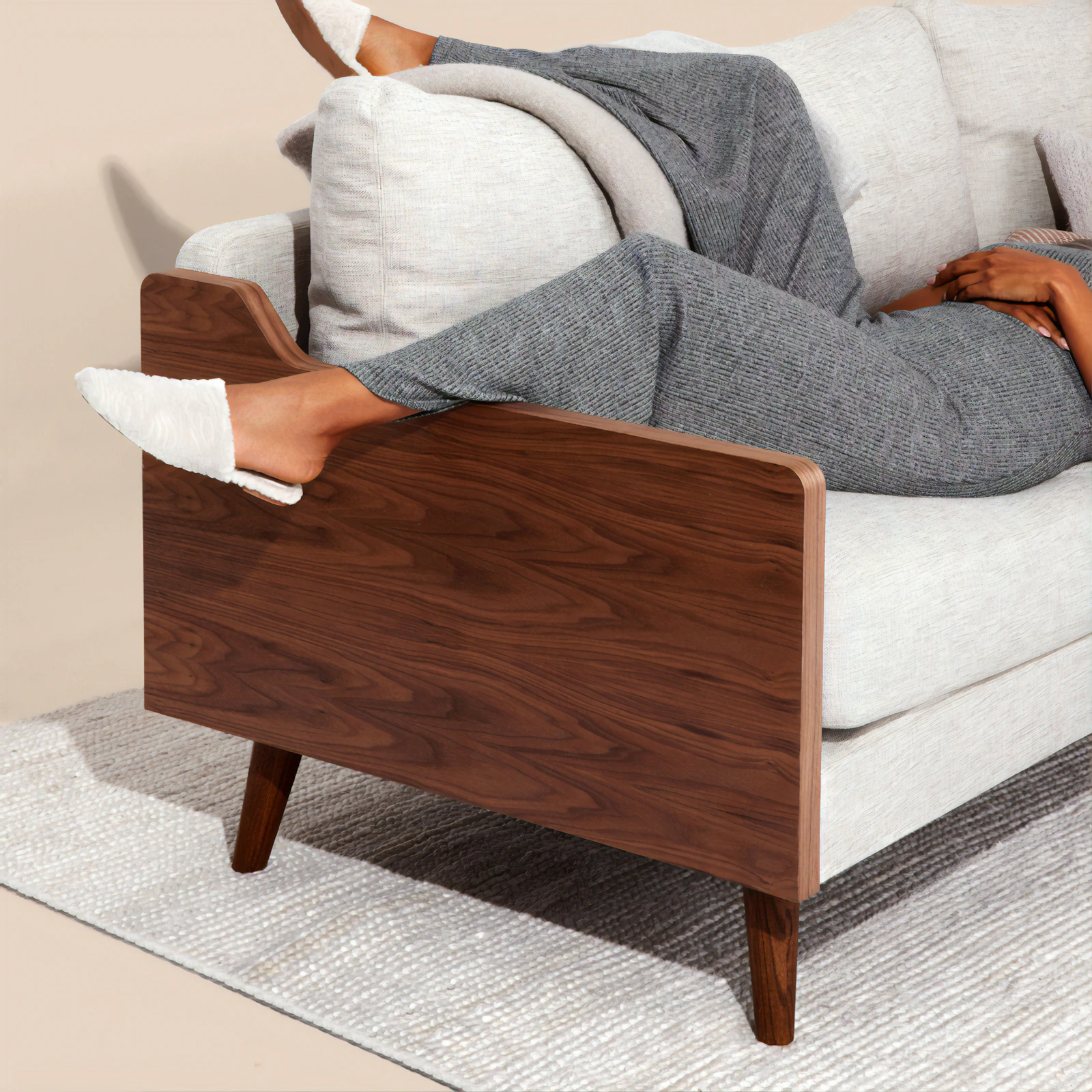 Person reclining comfortably in a quiet setting for guided relaxation