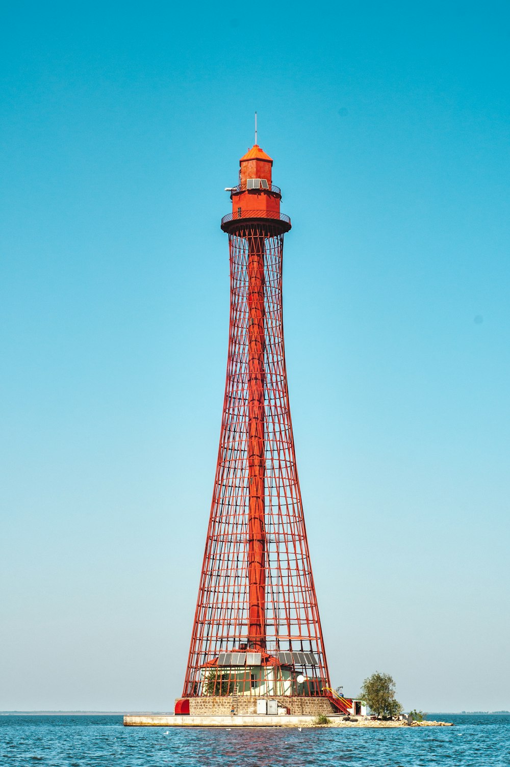 red lighthouse on isle