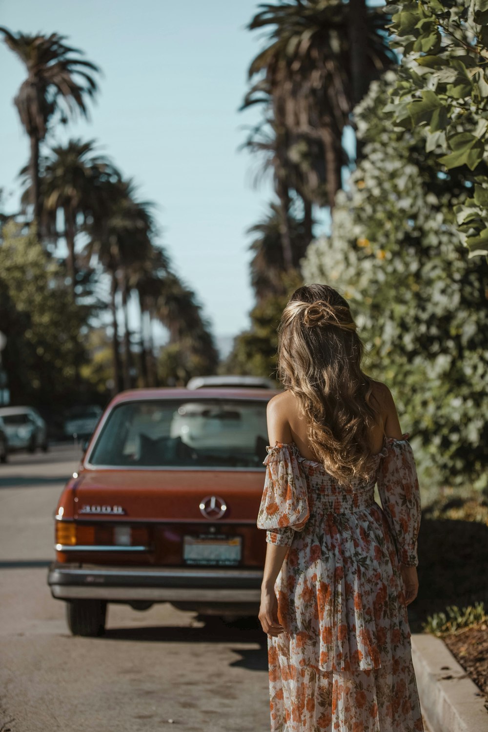 woman standing near vehicle