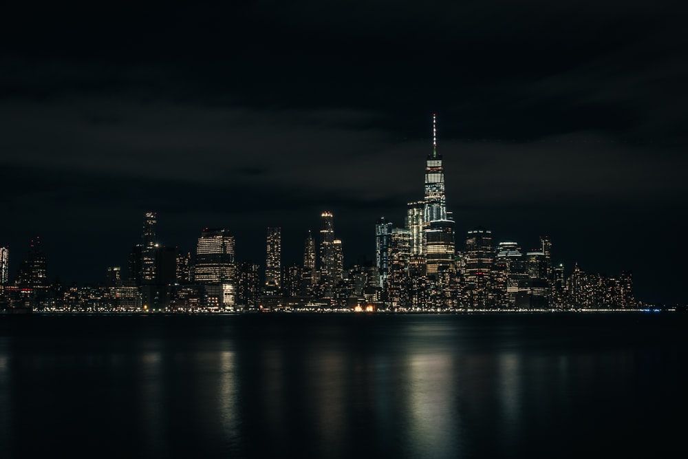 a view of a city at night from across the water