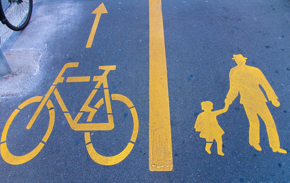 blue and yellow pedestrian lane