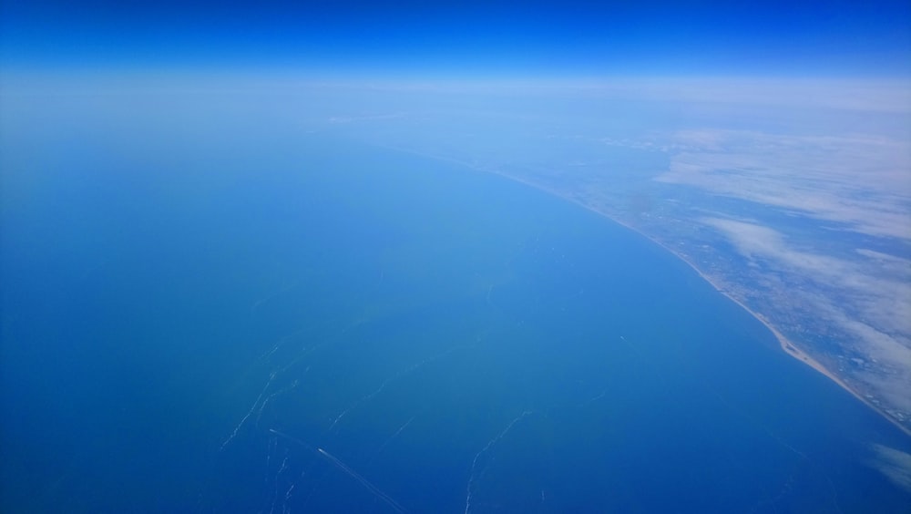 a view of the ocean from an airplane