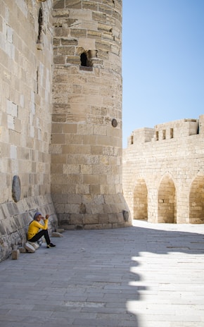 person sitting on ground