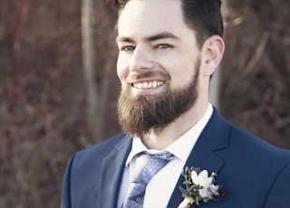 smiling man wearing suit