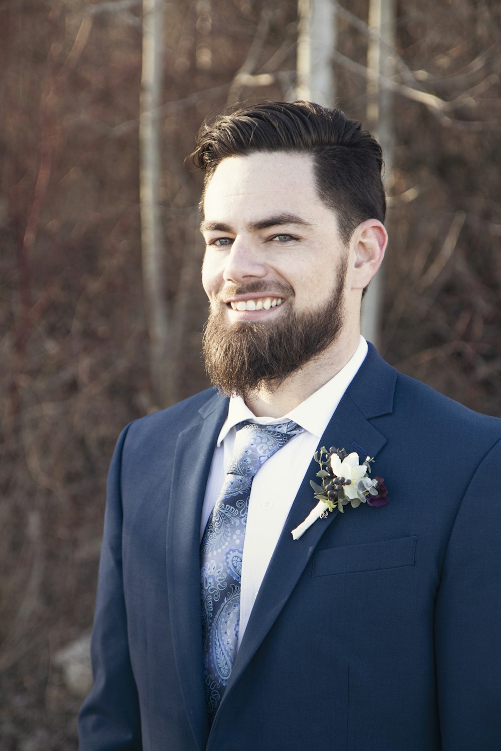 smiling man wearing suit