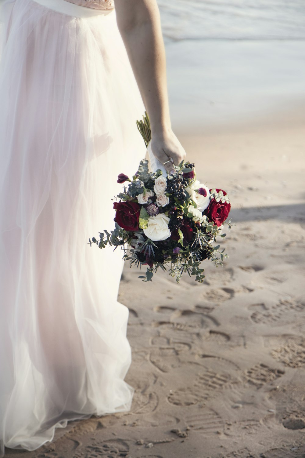 person holding bouquet of flower