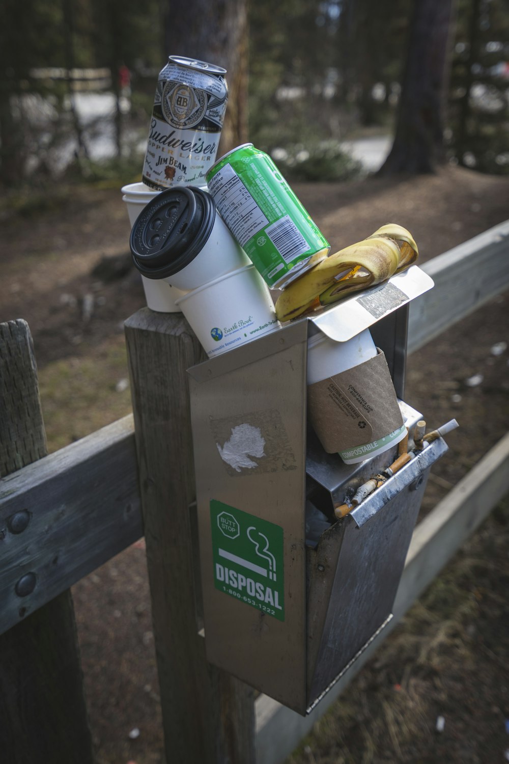 green can on brown mailbox