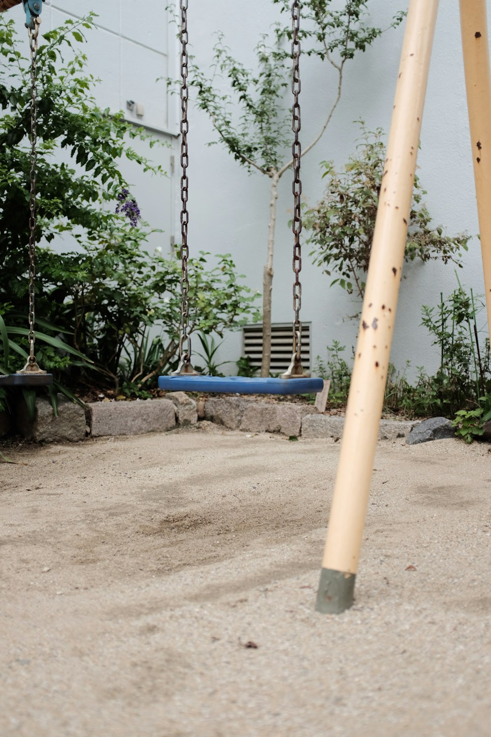 brown and blue outdoor swing