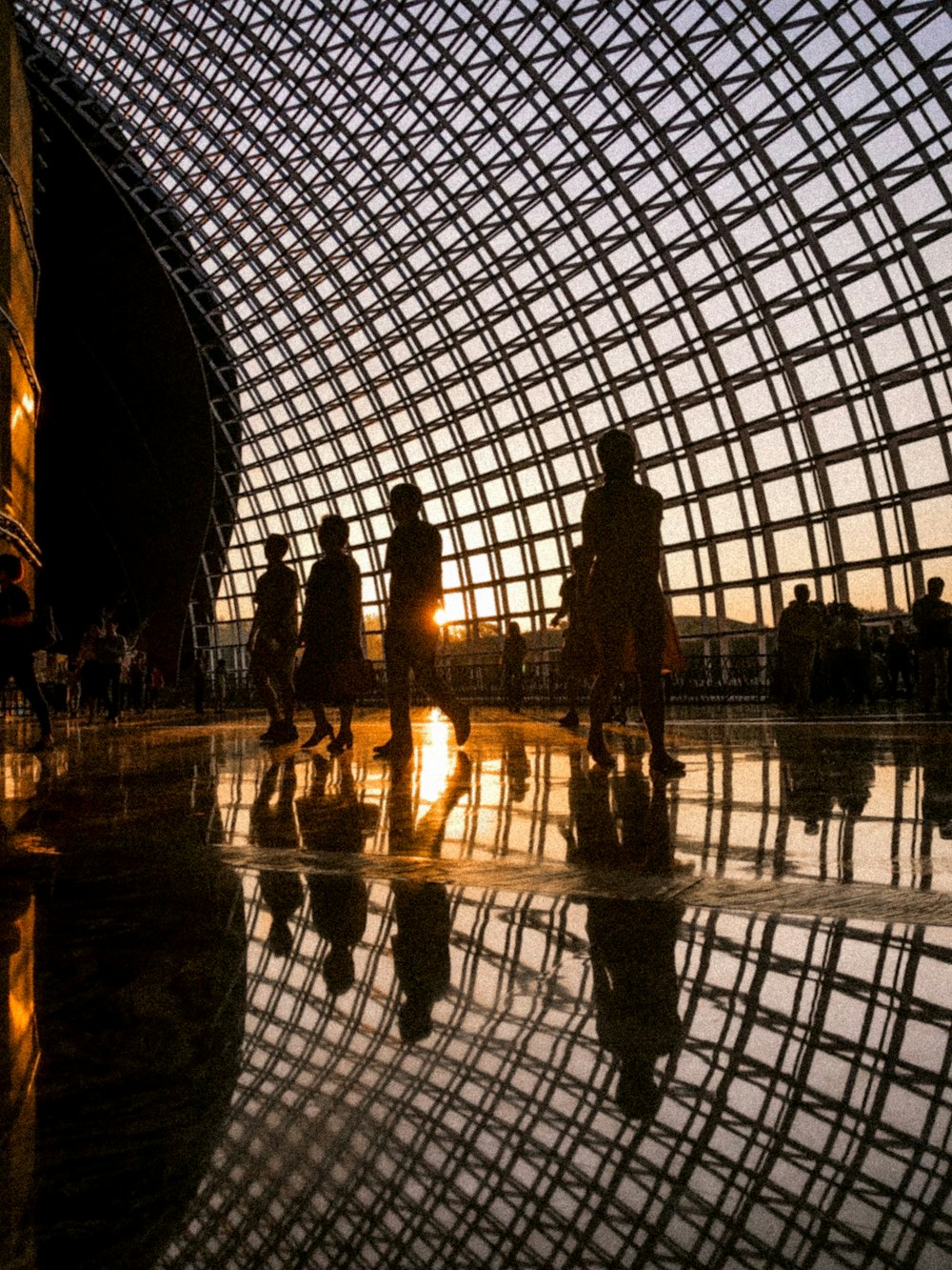 several people standing inside building