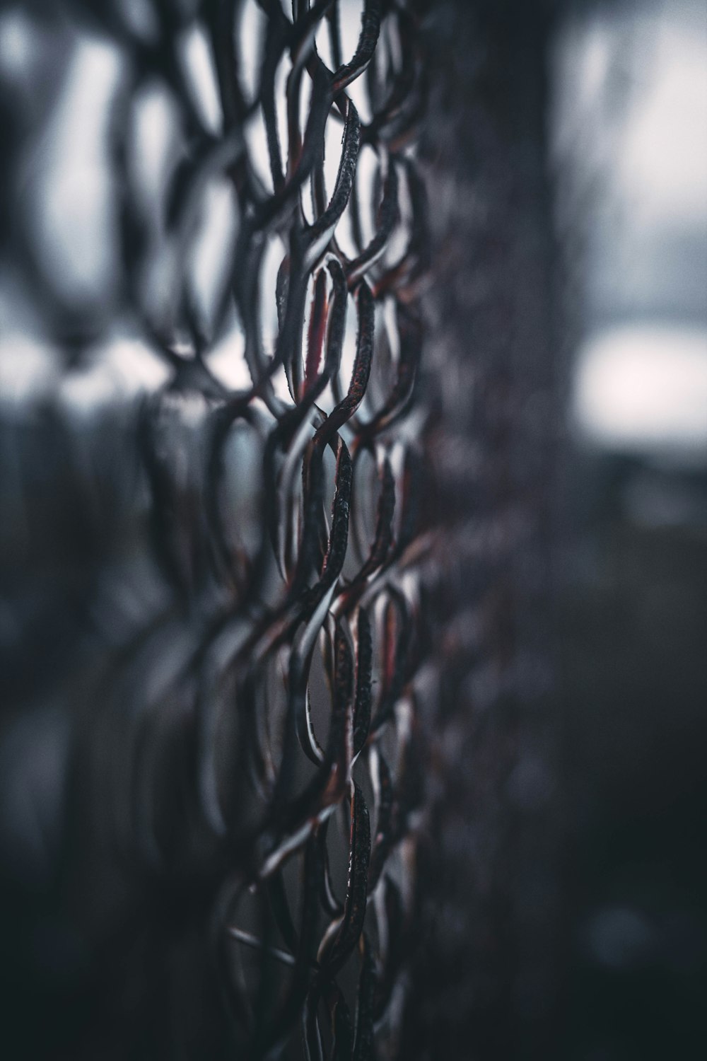 a close up of a chain link fence