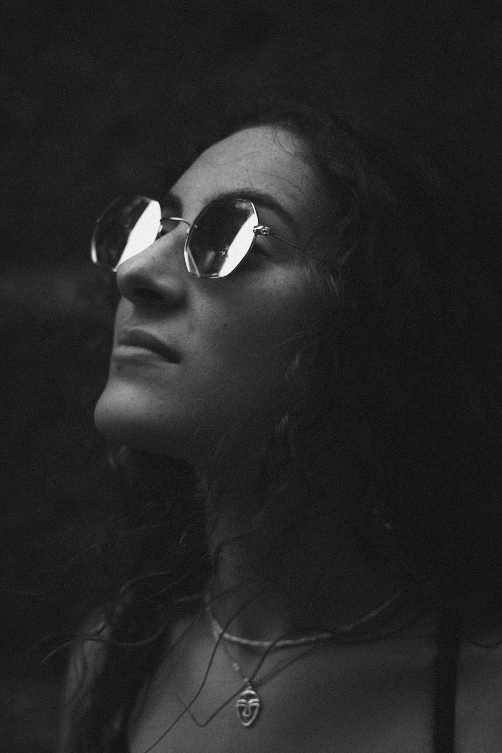 woman wearing framed sunglasses