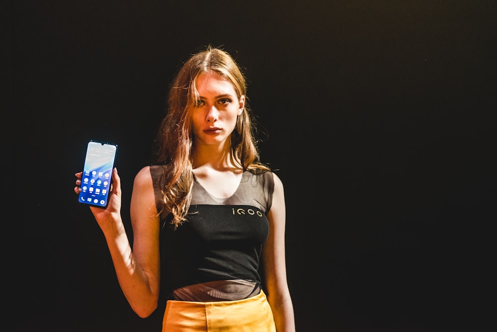 woman holding smartphone