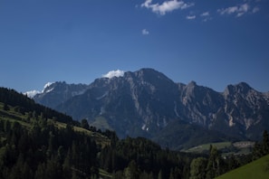 Majestic mountain range with crystal-clear blue sky
