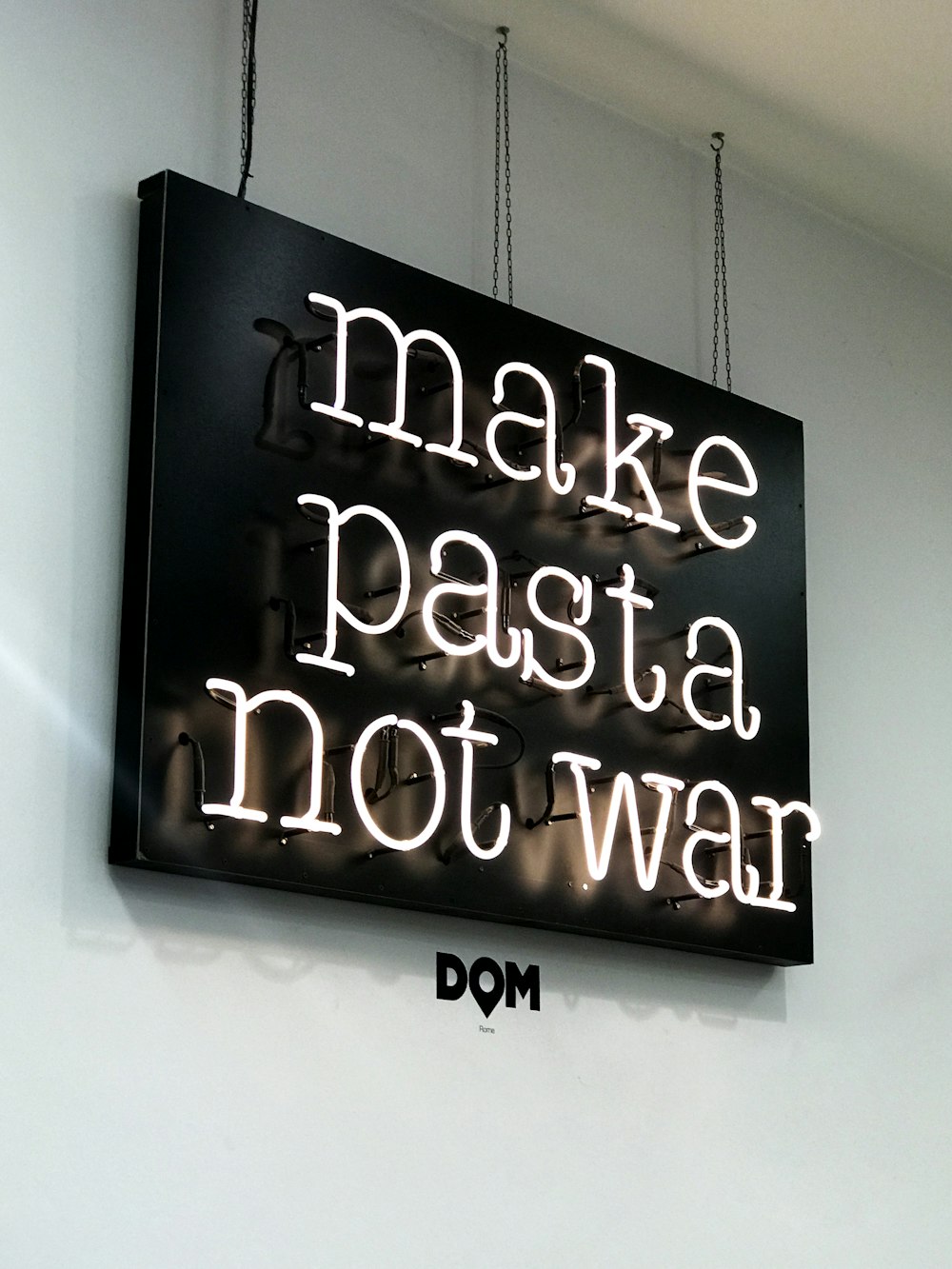 make pasta not war neon signage