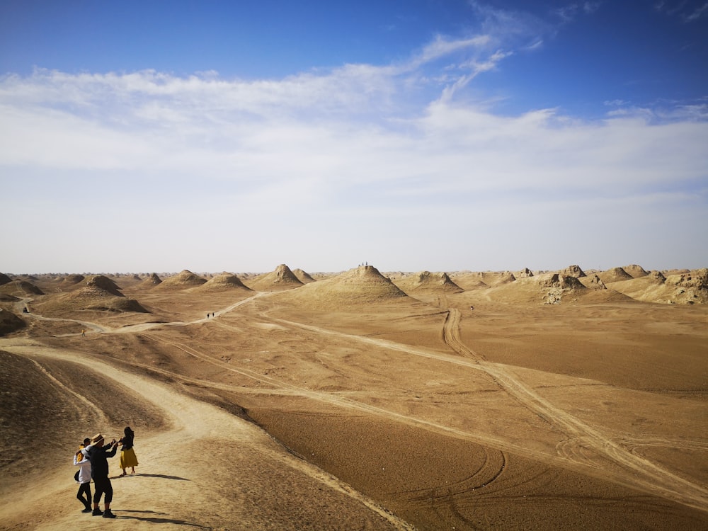 desert under cloudy sky during daytime