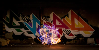 Psychedelic street art blending organic shapes and cyber sigils in olive and military green tones.