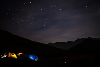 blue tent over star sky