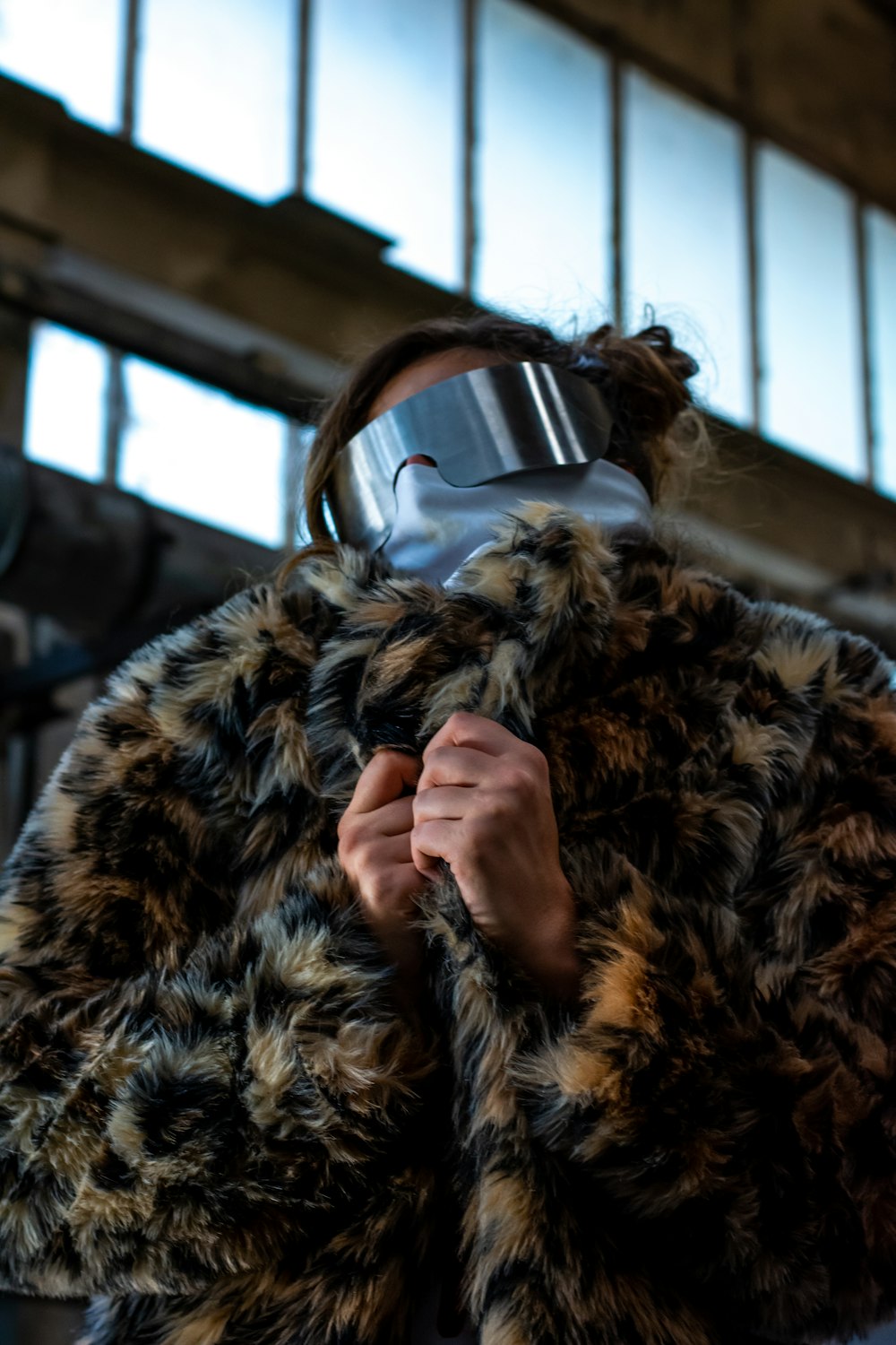 woman wearing brown and black fur coat