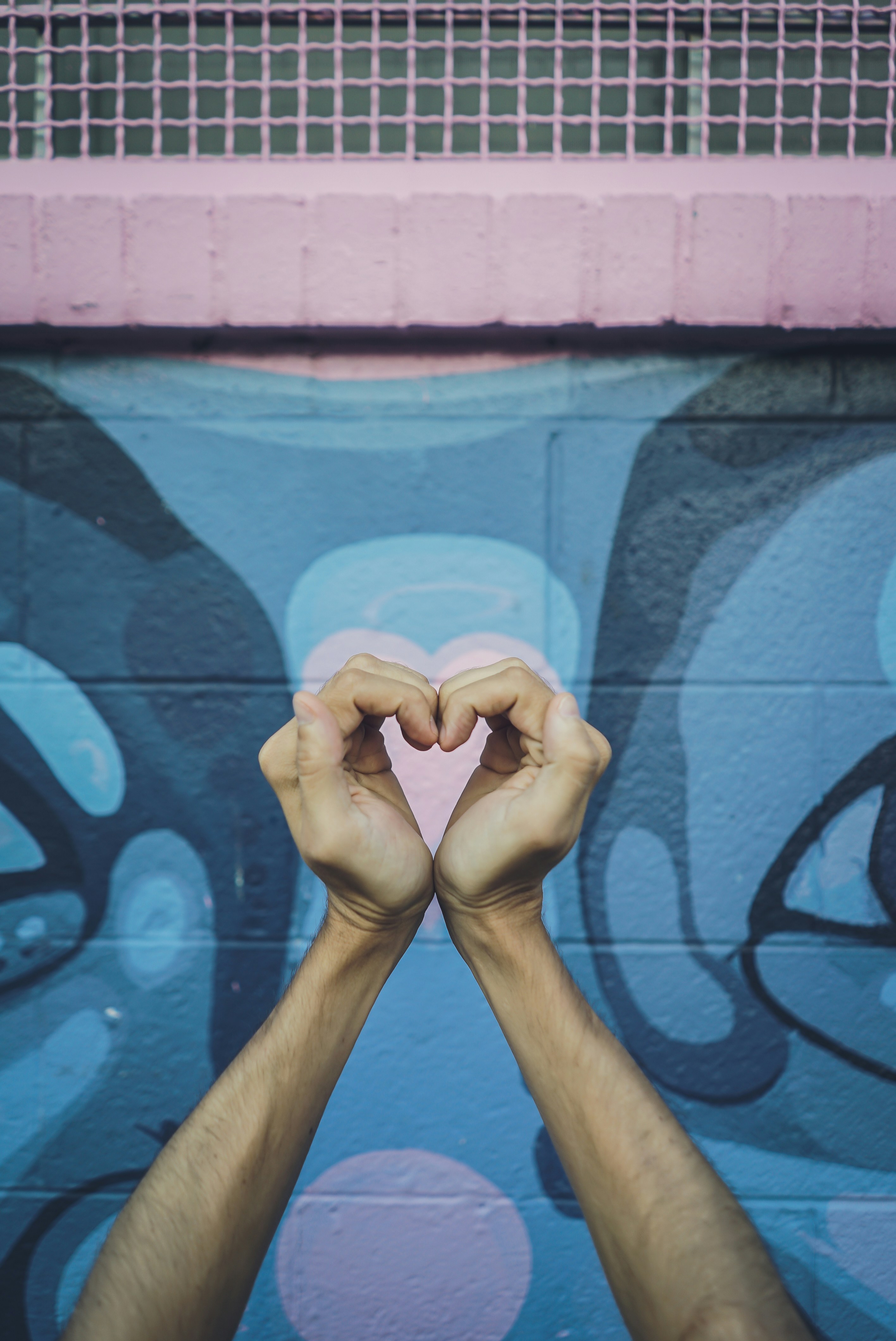 this is another version of creating a heart with two hands and having the cool blue color background at Santa Fe. Santa Fe is the art district of Denver. Make sure you don't forget your camera if you come for a visit.