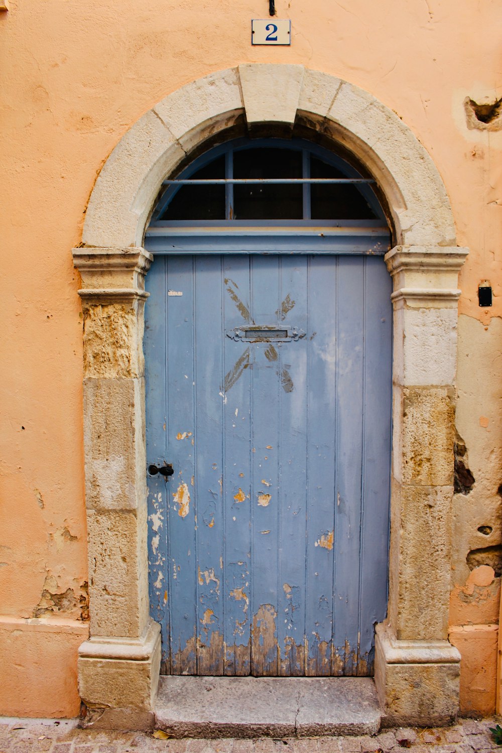 closed blue wooden door