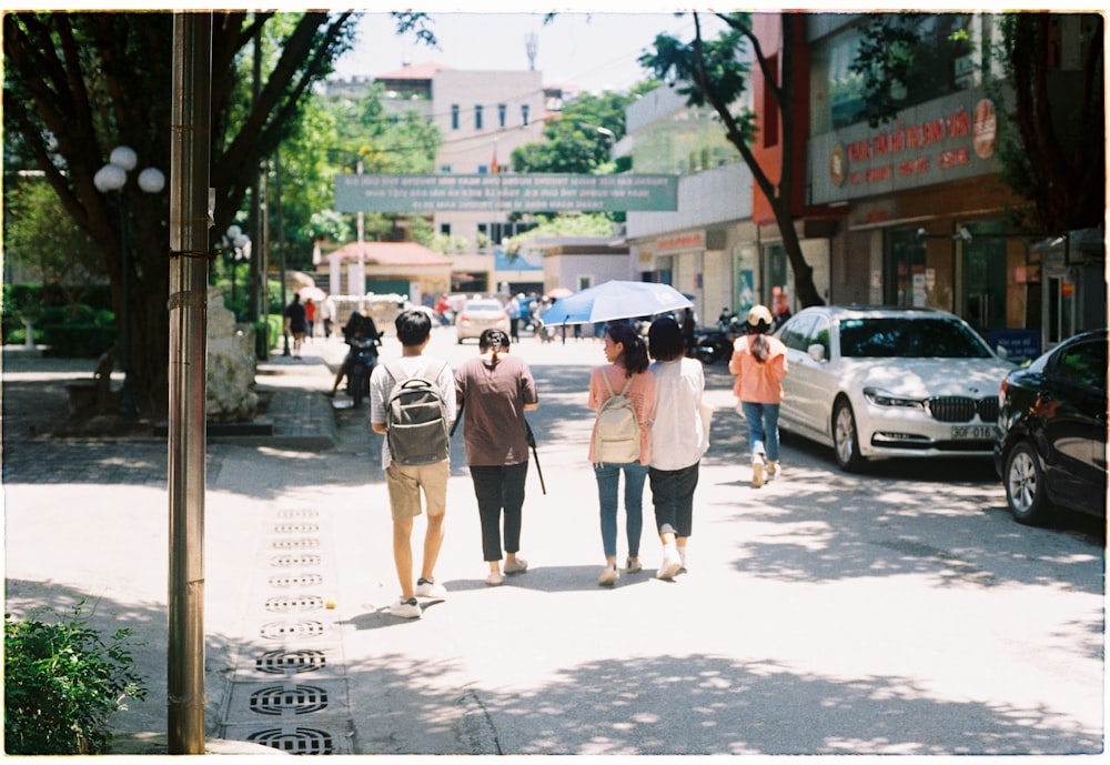 people walking on road