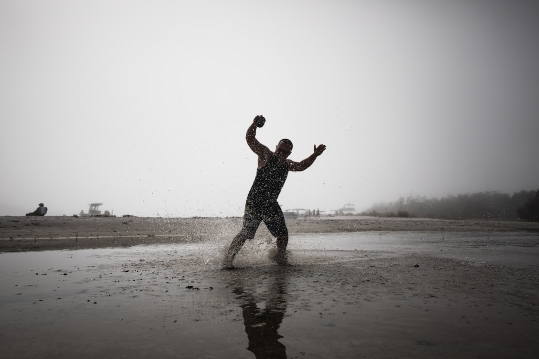 man standing in water