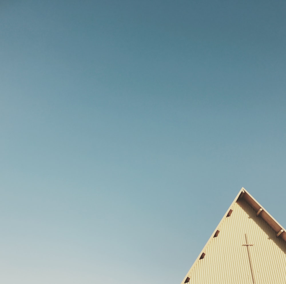 triangular building under blue sky