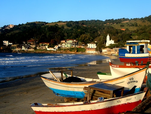 A scenic view of a coastal Puerto Rican town with traditional fishing boats.