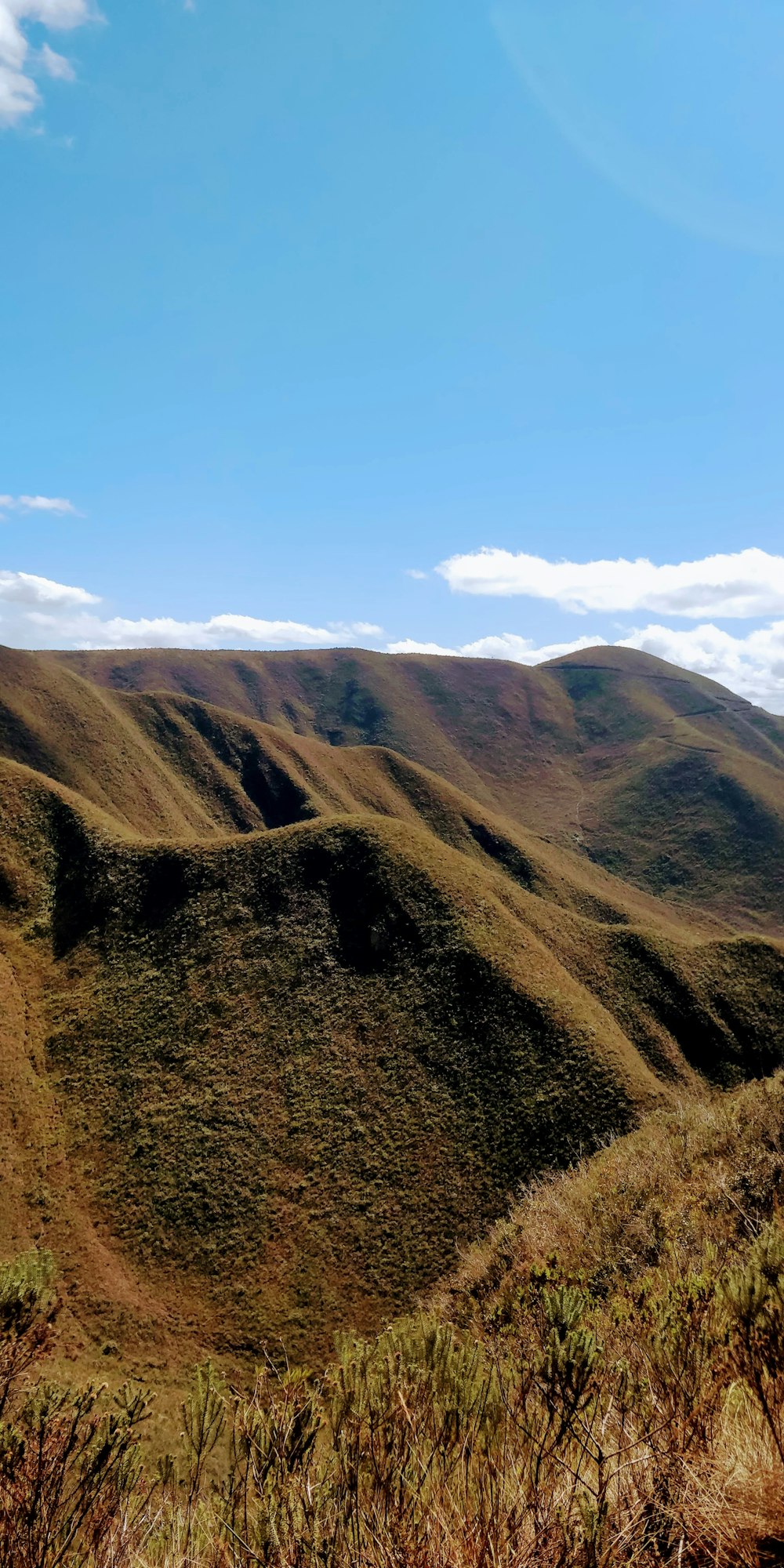 green mountain under blue sky \