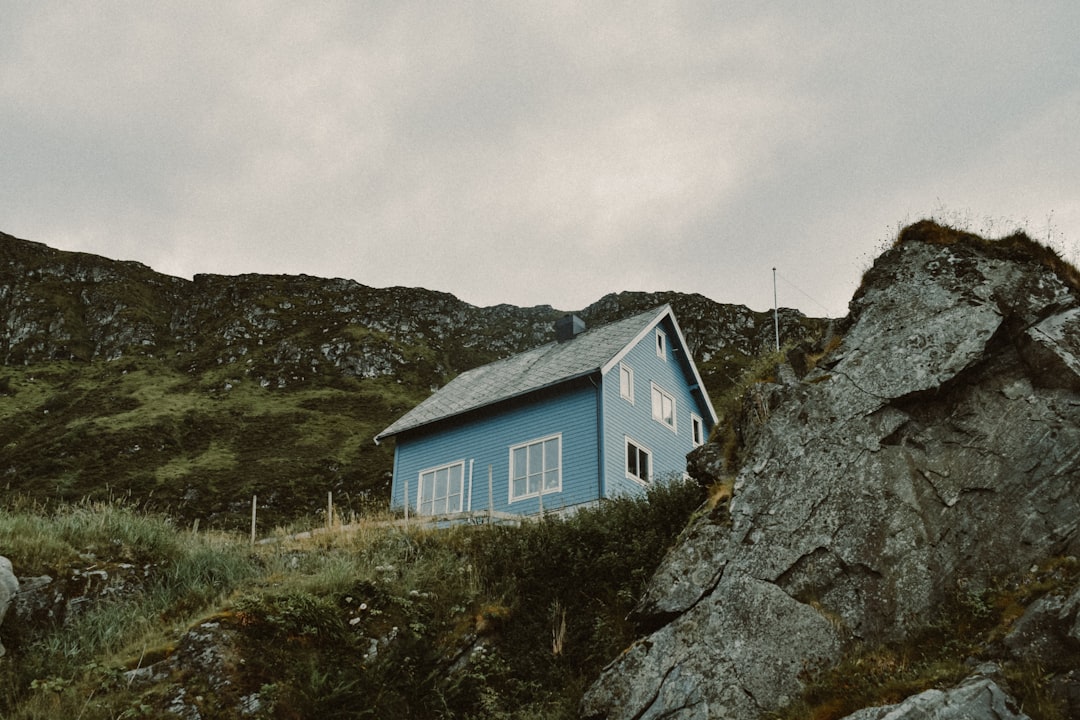 blue house on mountain slope