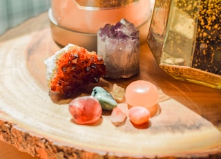 a wooden table topped with different types of rocks