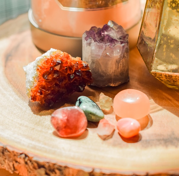 a wooden table topped with different types of rocks