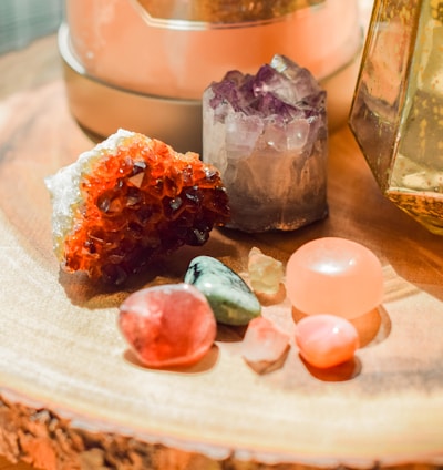 a wooden table topped with different types of rocks