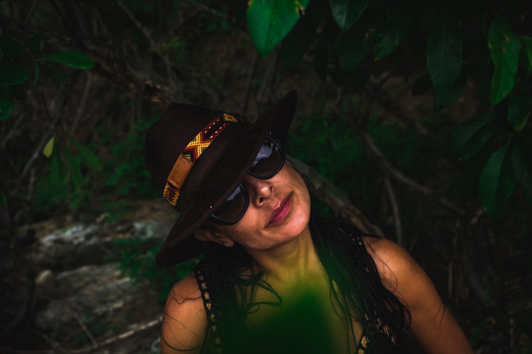 woman standing near trees