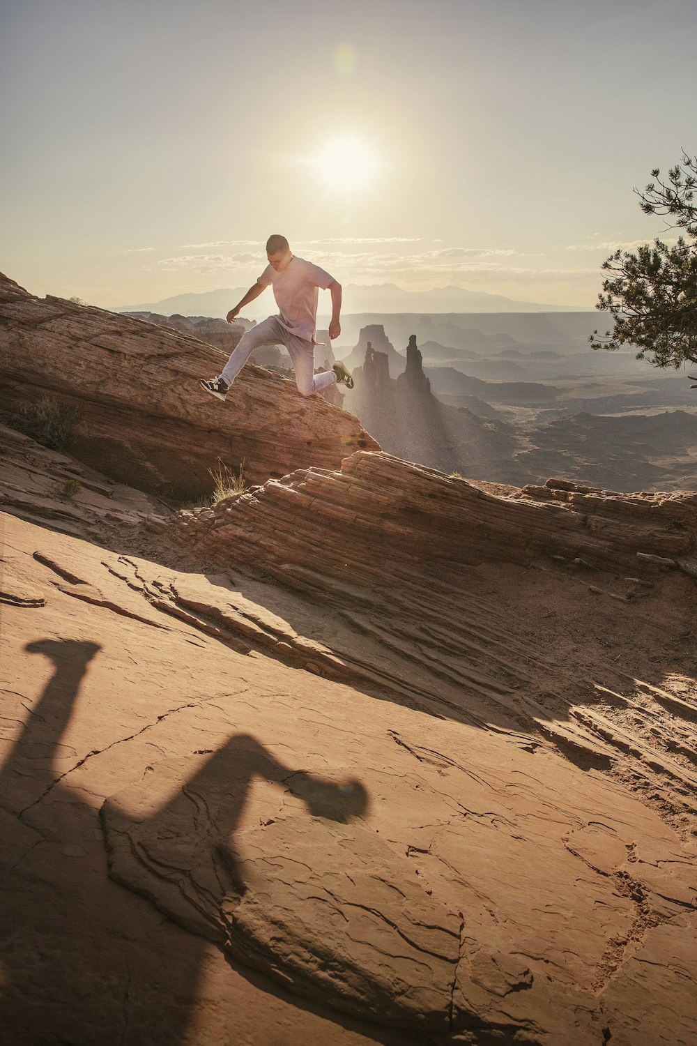 man jumping under sunlight