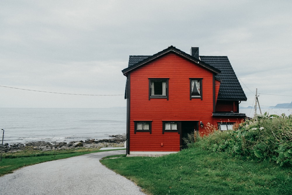 red and black house near bushes